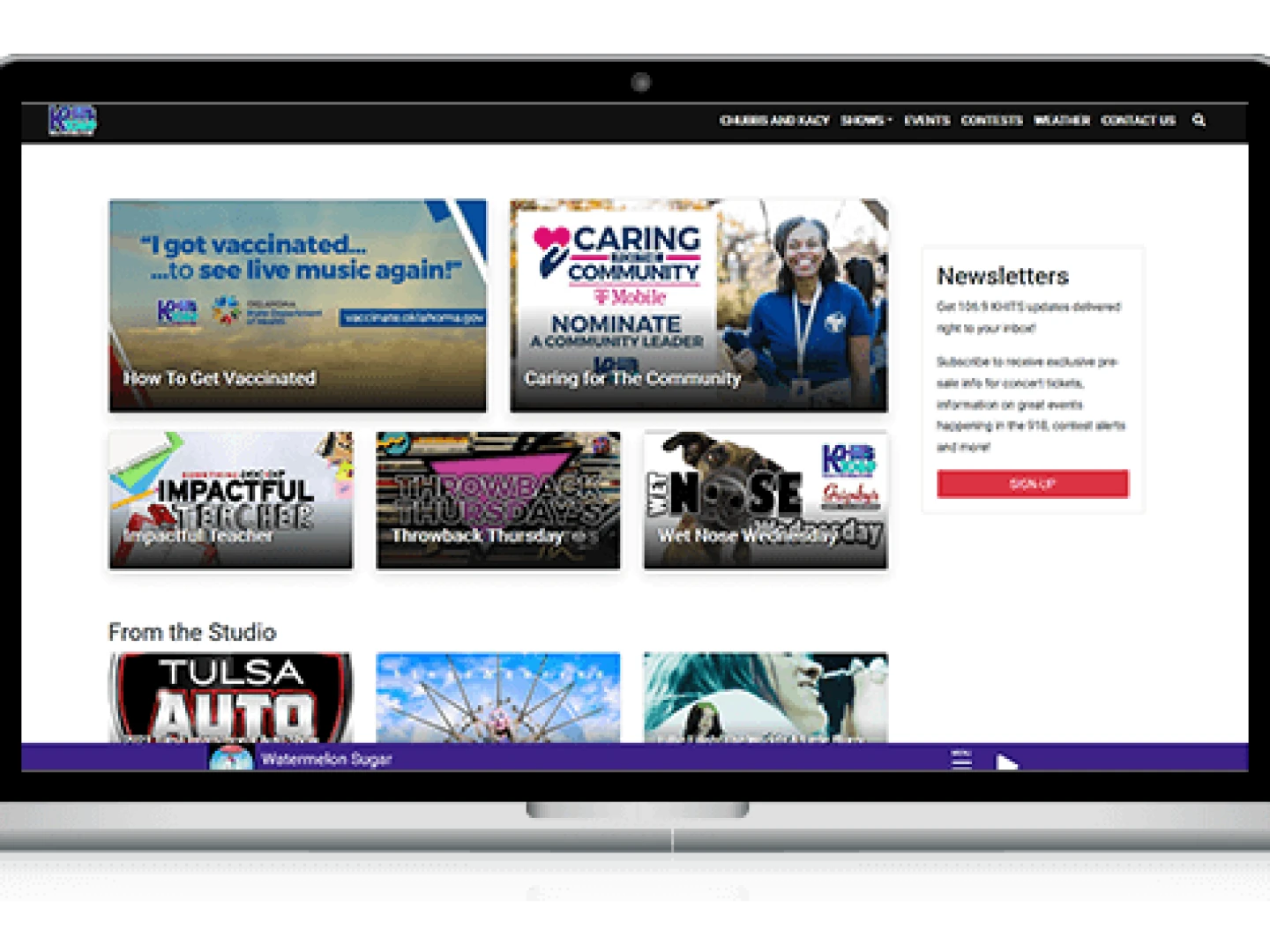laptop showing the homepage of khits.com