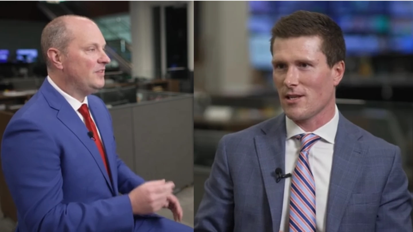 Photo: news9.com Republican Oklahoma Attorney General candidate Jon Echols in a blue suit and red tie during an interview on the left