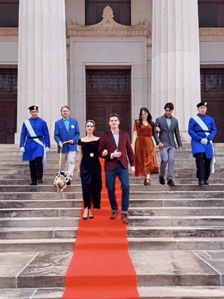 On location in Guthrie, Oklahoma, on the steps of the historic Scottish Rite Temple, which doubled as our fictional palace. May 20, 2026 From left: David Merrick as a Caldenian Royal Guard; John Gibson Miller as King Roman of Calden with Cannon, the royal dog; Alexandra Harris as the princess; Robert Palmer Watkins as her co-lead; Karsten Tate; Jamil Karn; and Joshua Yuen. A full cast and crew list is available on IMDb.