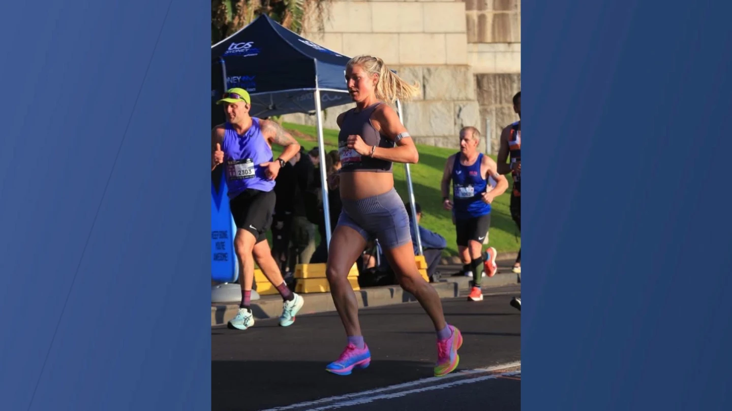 Photo: newson6.com Oklahoma City runner Ali Andrews competes in the Sydney Marathon while 32 weeks pregnant. Andrews finished in 2:58:43 and