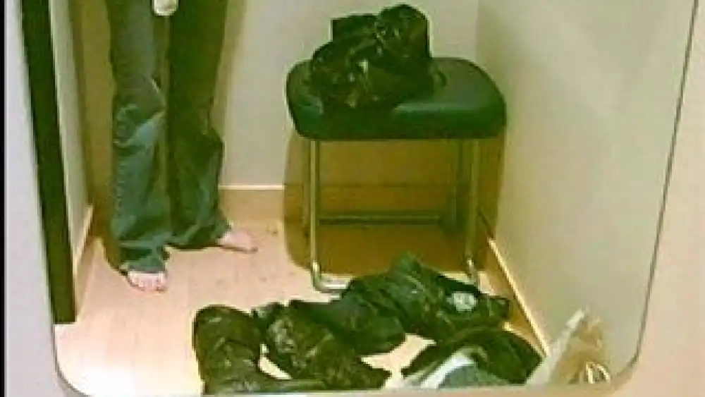 why are the target dressing room mirrors green Why Do Target's Fitting Room Mirrors Glow Green When Touched?
